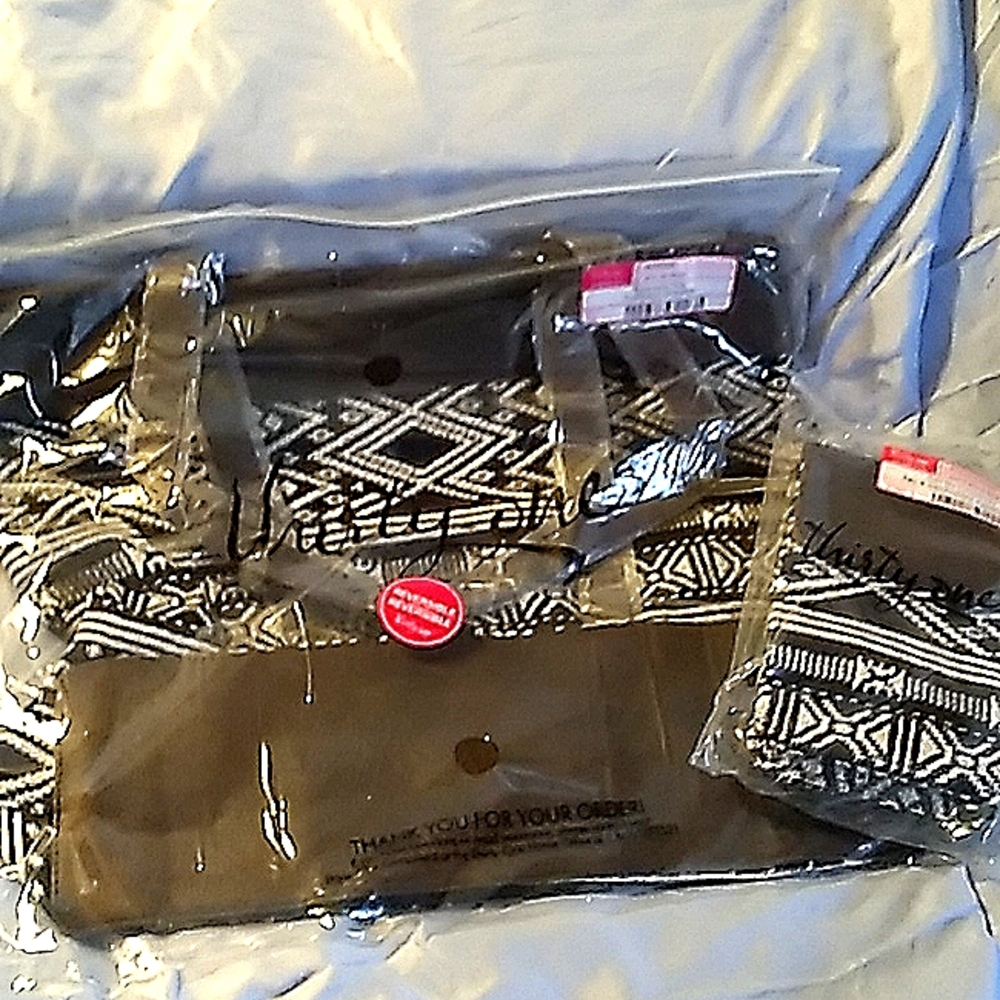 Thirty one reversible Rio Weave tote and matching crossbody